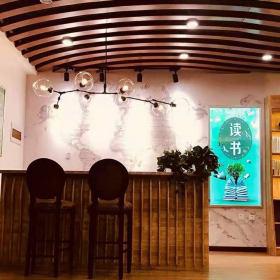 西安曲江某休闲书吧定制款桌椅沙发书柜安装结束